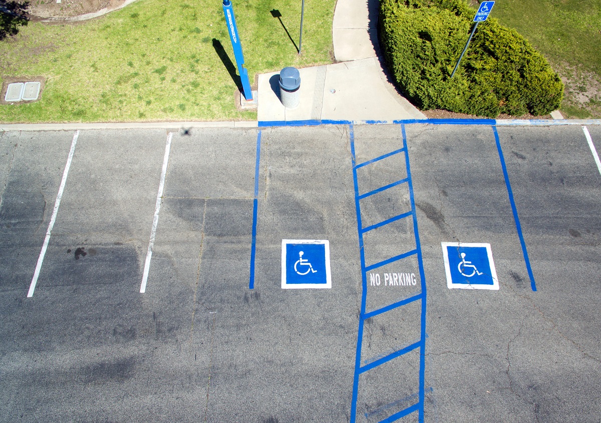 What Are The Blue Crosshatched Stripes Next To Disabled Parking Spots