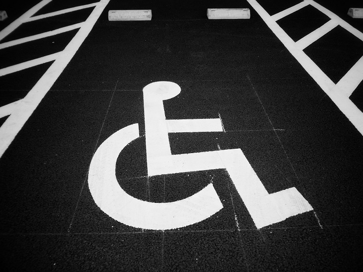 black and white disabled parking signage