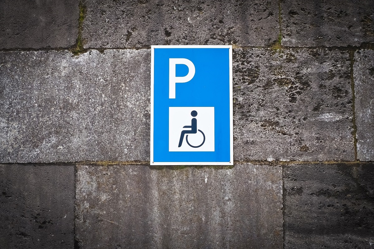 disabled parking sign on wall
