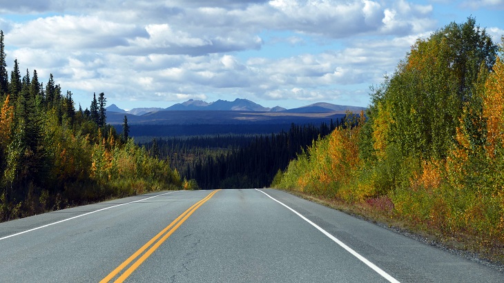 alaska road with mountain