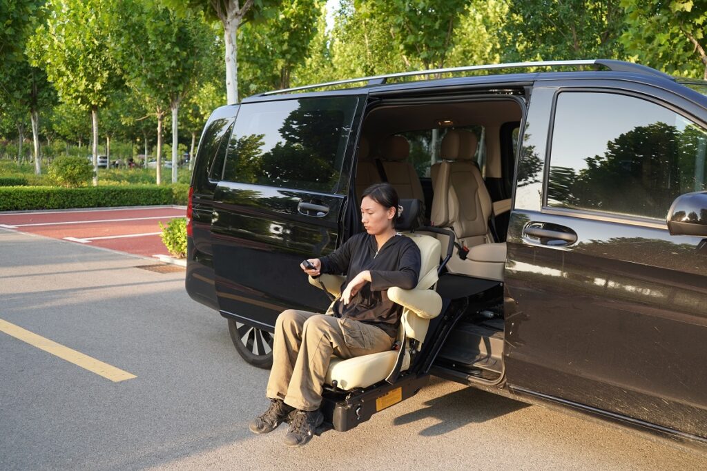 Person using chair lift in accessible van