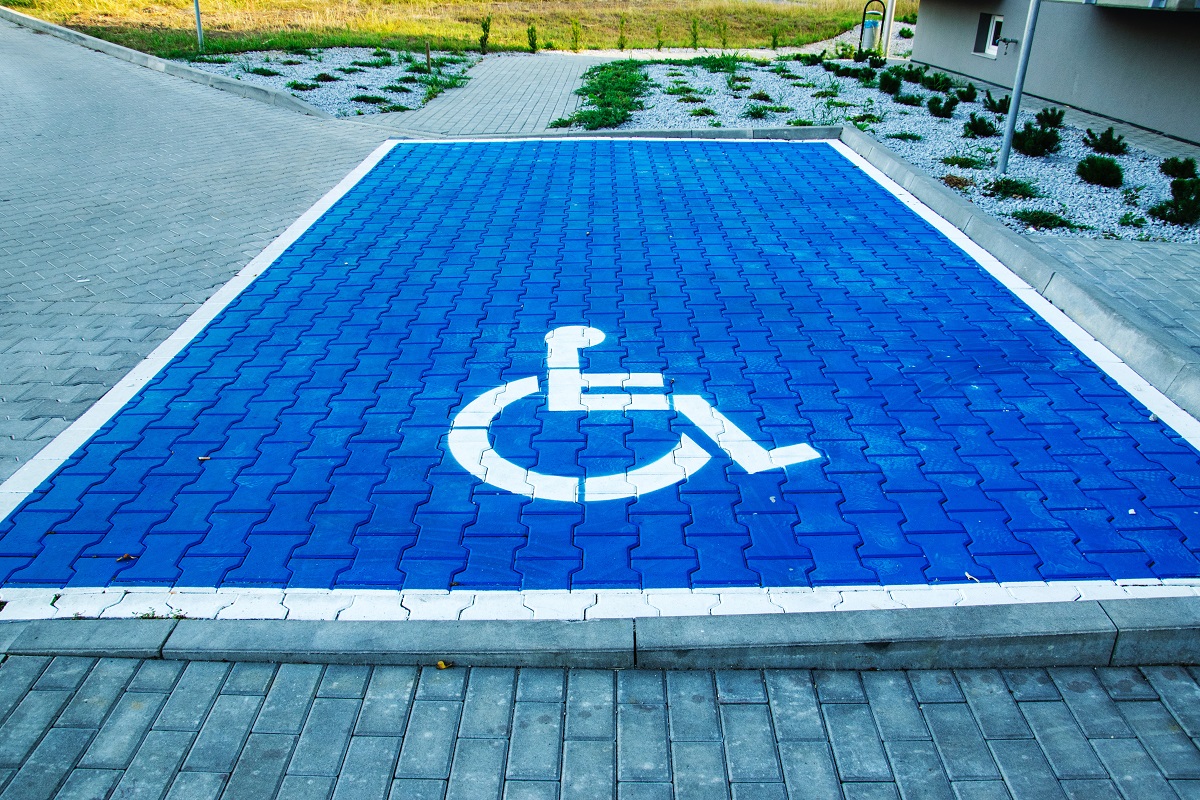 painted disabled parking sign