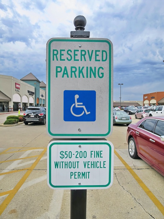 reserved disabled parking sign